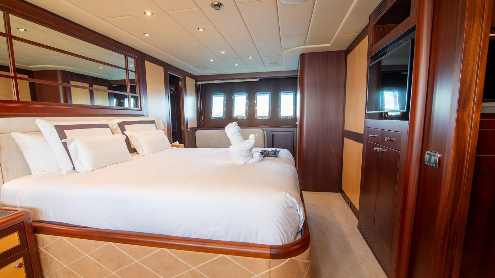 a bed in a room aboard HELLS BELLS Yacht for Sale