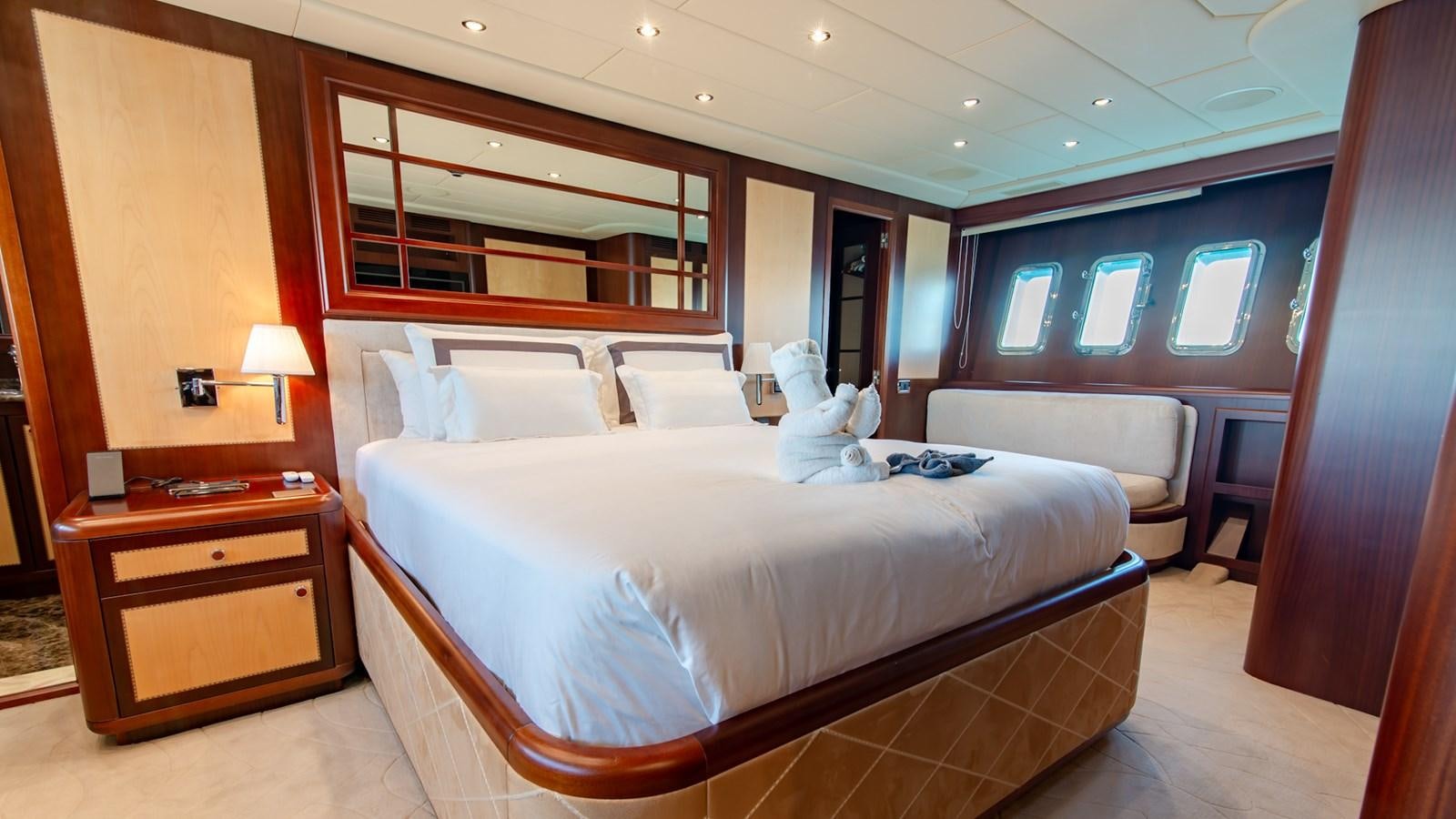 a room with two beds aboard HELLS BELLS Yacht for Sale