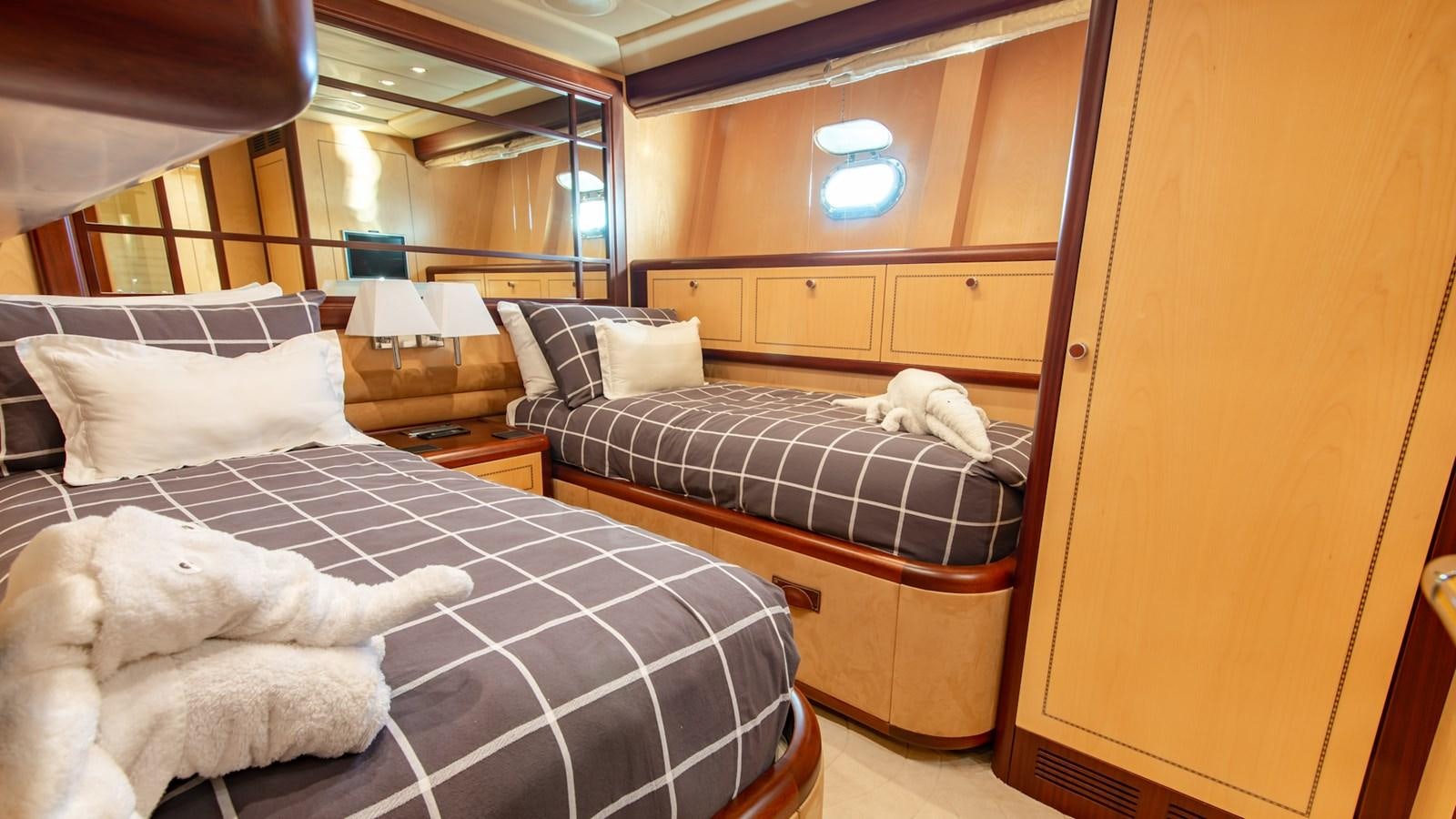 a couple of beds in a room aboard HELLS BELLS Yacht for Sale