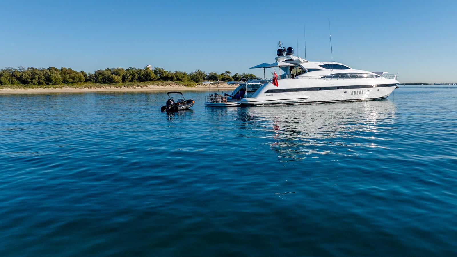 a boat sailing on the water aboard HELLS BELLS Yacht for Sale