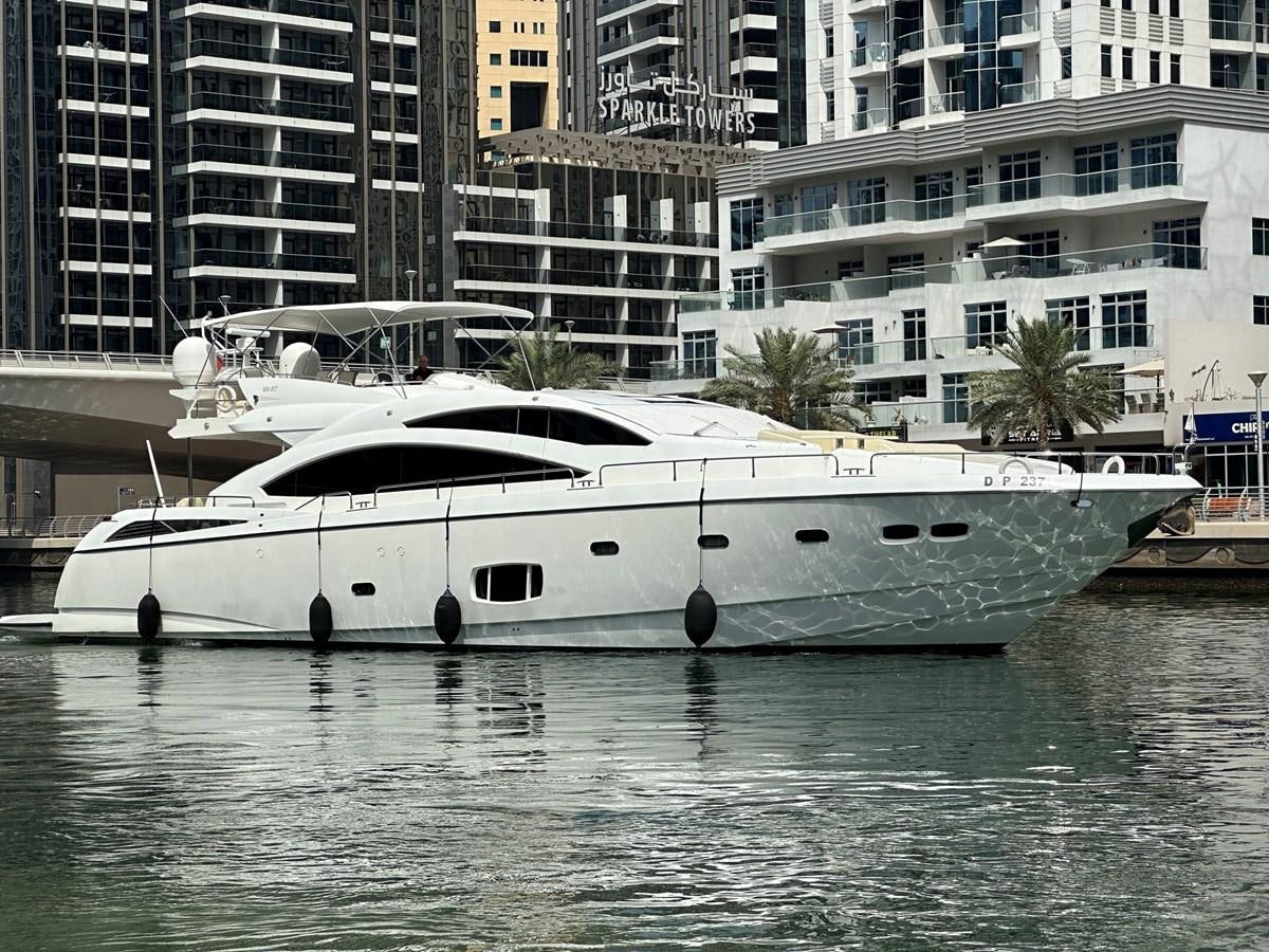 a white boat in the water aboard MANIA Yacht for Sale
