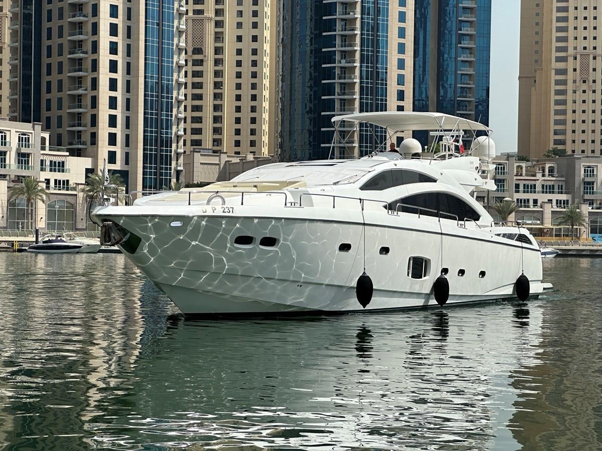 a white yacht in the water aboard MANIA Yacht for Sale
