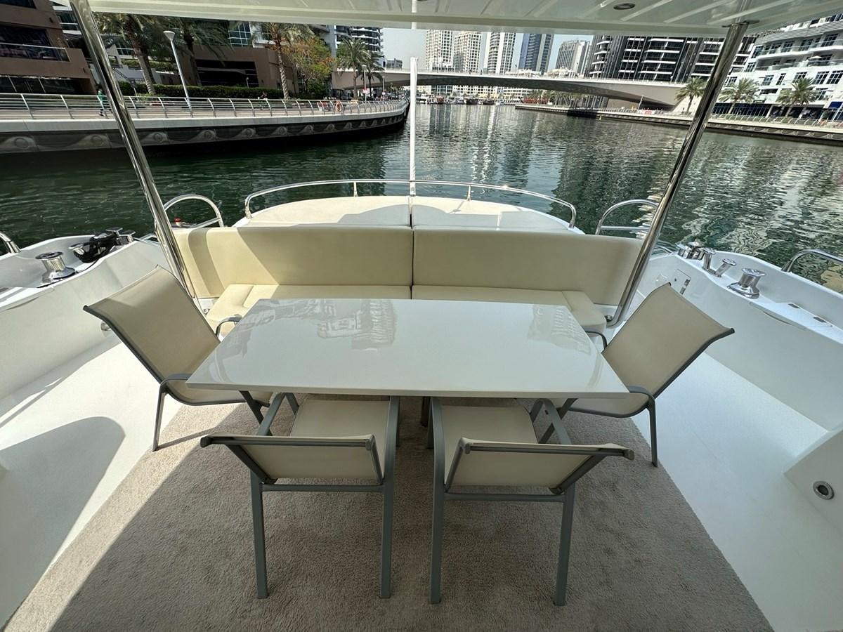 a table on a boat aboard MANIA Yacht for Sale