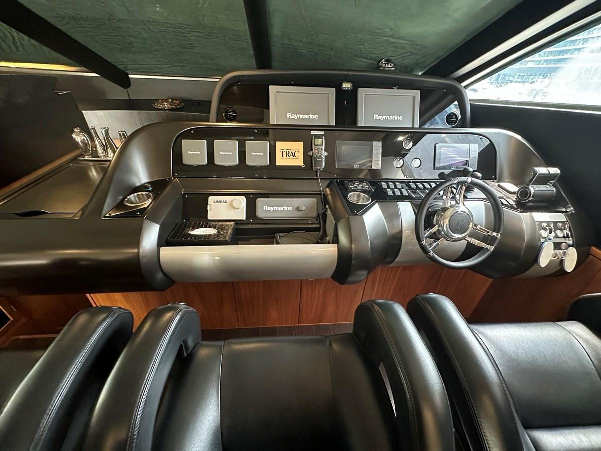 the inside of a car aboard MANIA Yacht for Sale