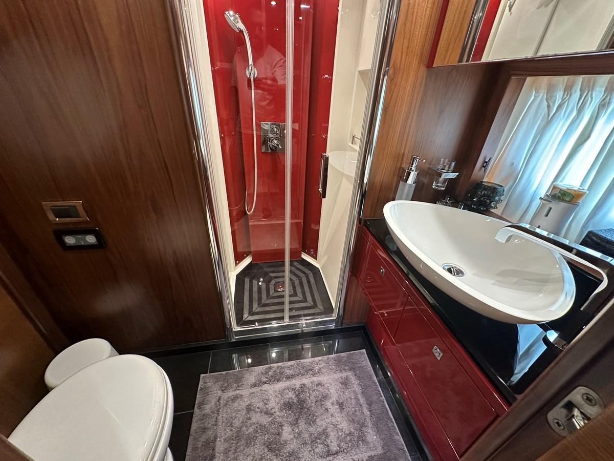 a bathroom with a sink and a shower aboard MANIA Yacht for Sale