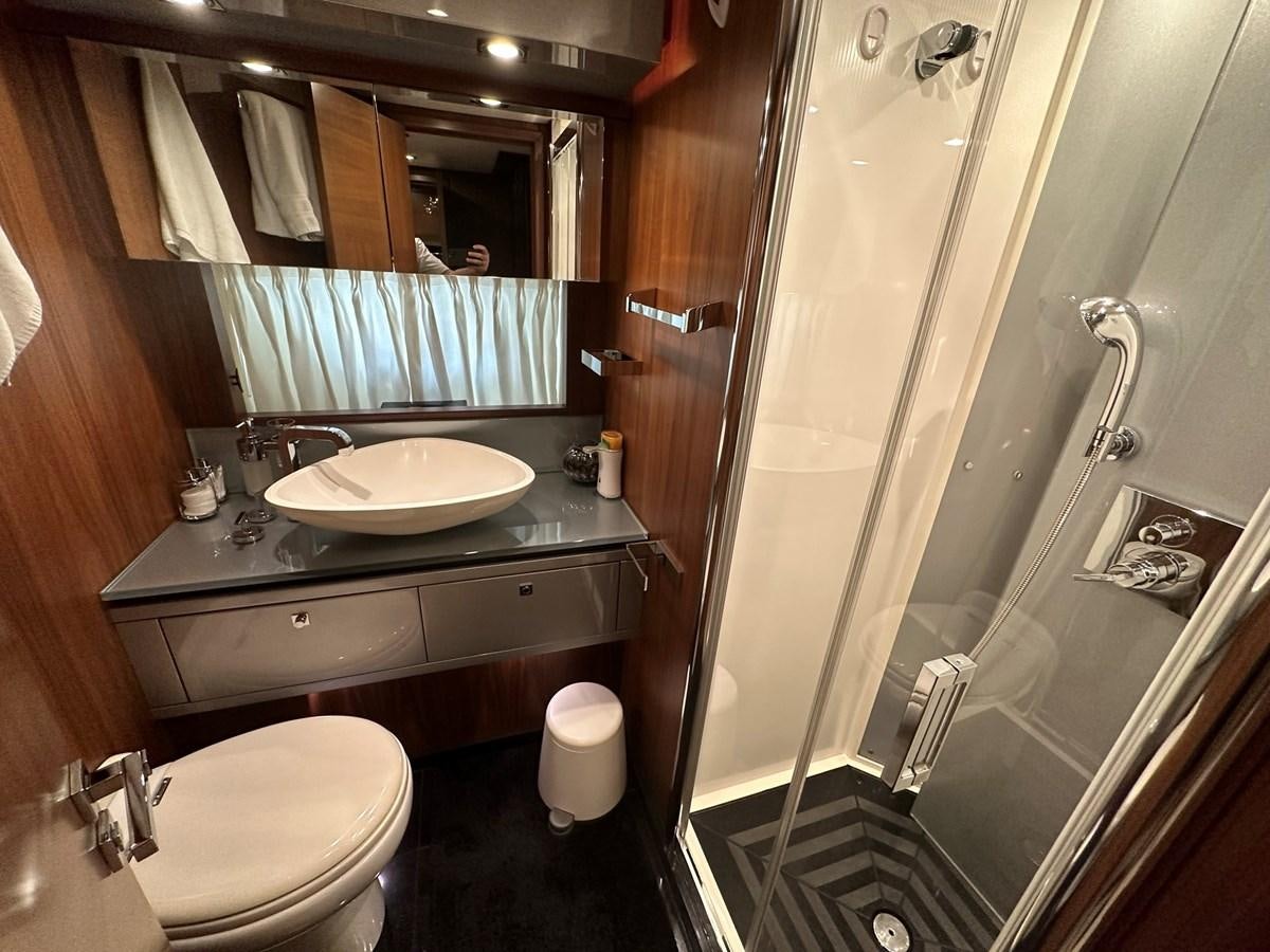 a bathroom with a sink and a toilet aboard MANIA Yacht for Sale