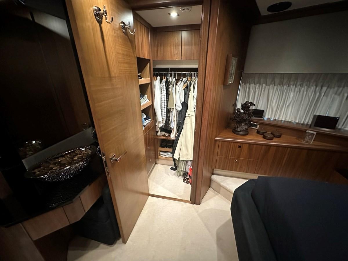 a room with a large mirror aboard MANIA Yacht for Sale