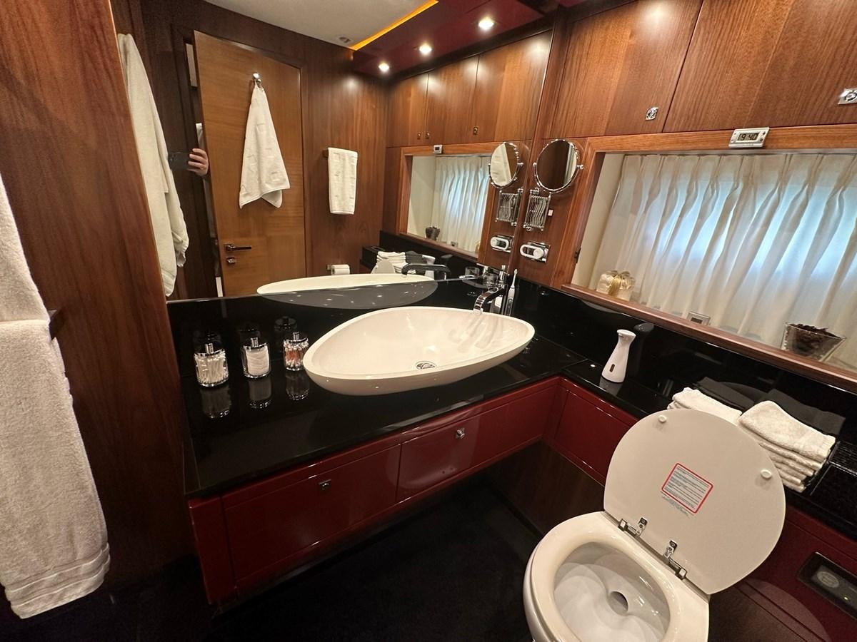 a bathroom with a sink and toilet aboard MANIA Yacht for Sale