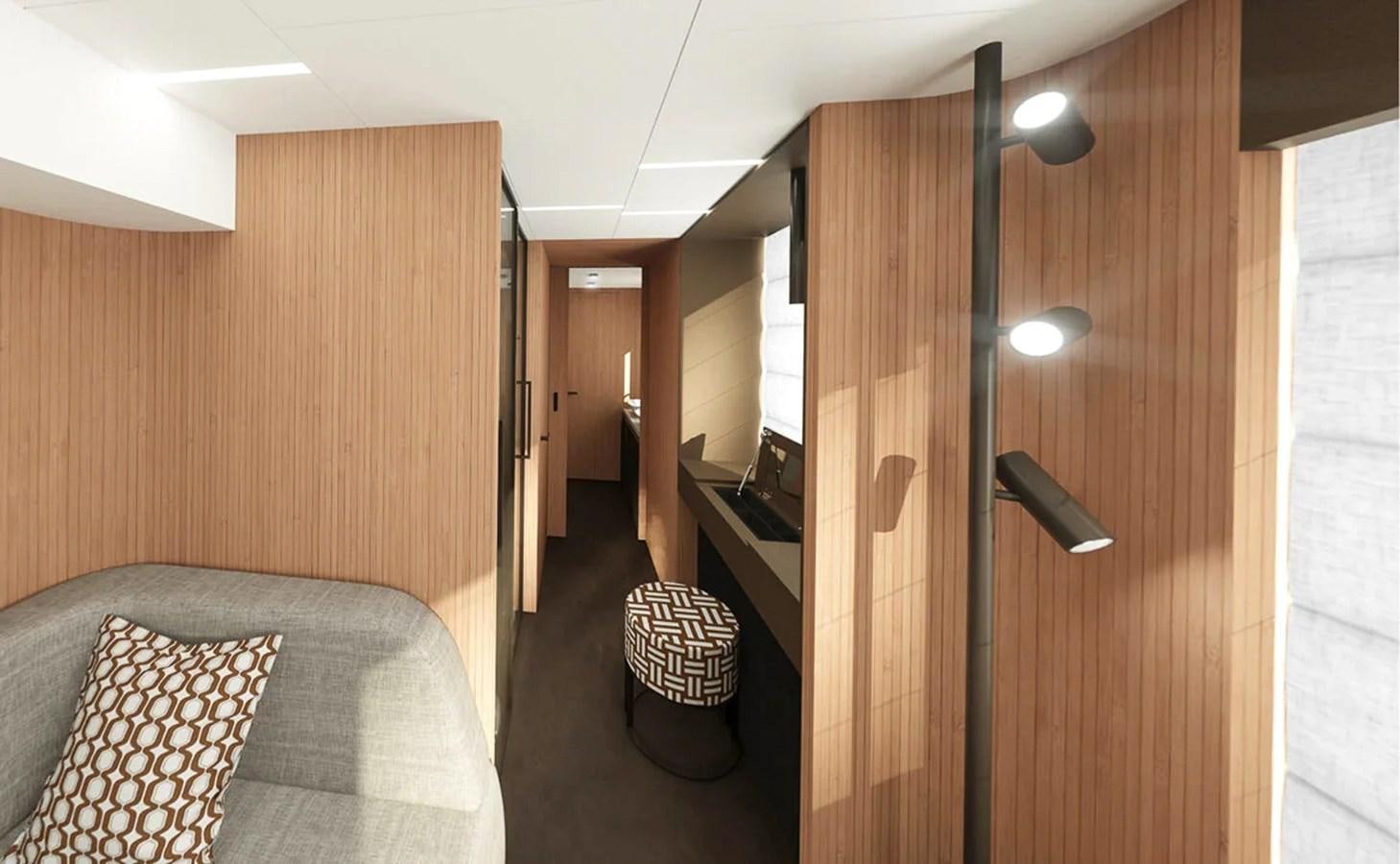 a room with a bed and a couch aboard AQUON ONE Yacht for Sale