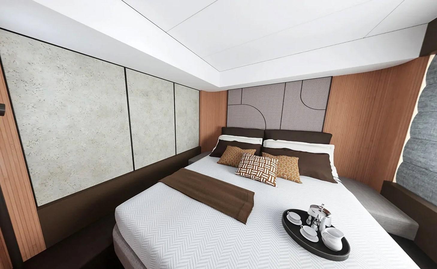 a bed with a white bed spread aboard AQUON ONE Yacht for Sale