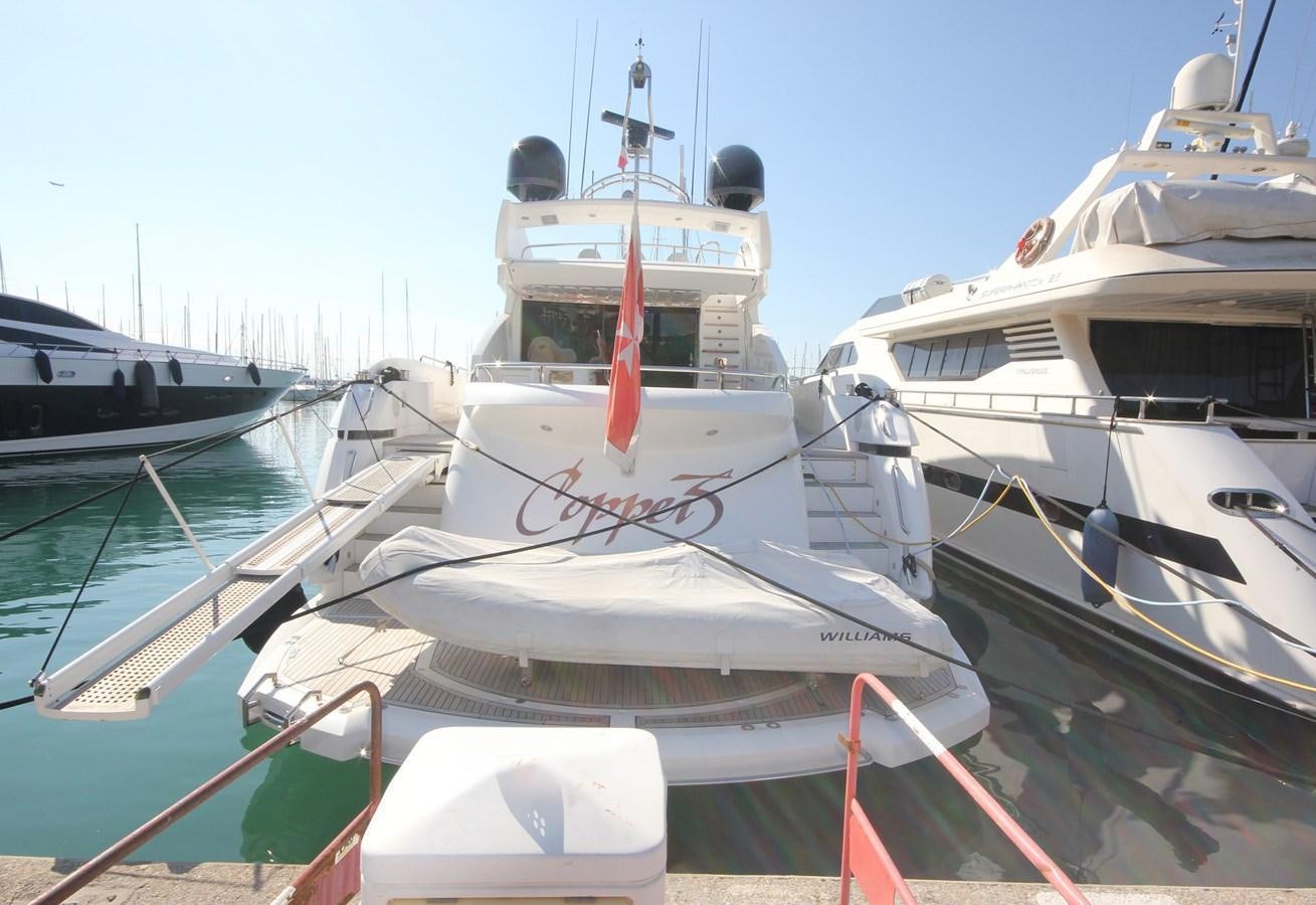 a boat docked at a pier aboard COPPER 3 Yacht for Sale