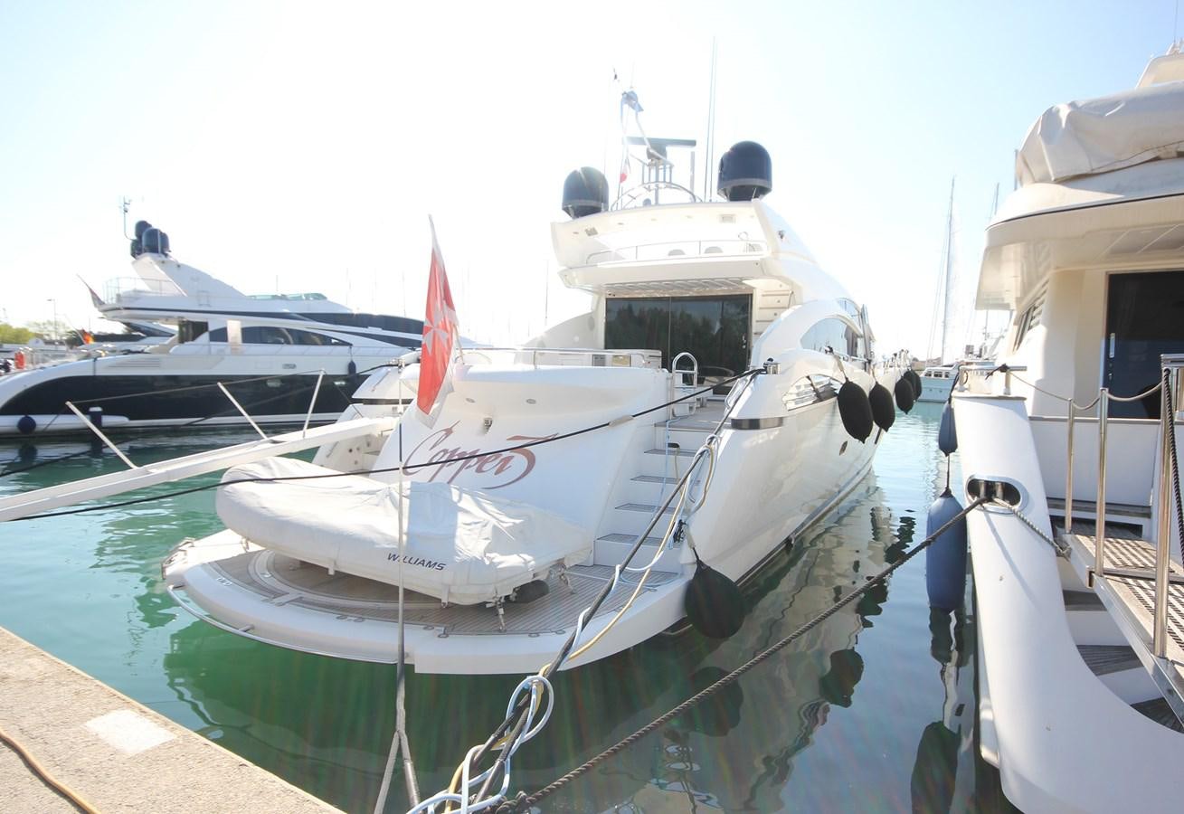 a boat docked at a pier aboard COPPER 3 Yacht for Sale