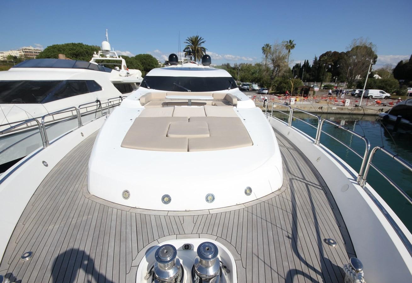 a white boat on a deck aboard COPPER 3 Yacht for Sale