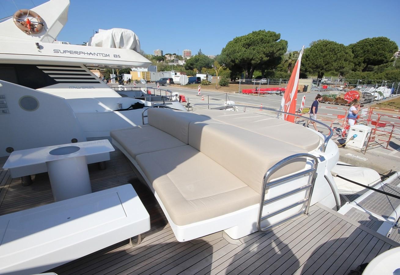 a deck with a couple of white boats and people on it aboard COPPER 3 Yacht for Sale