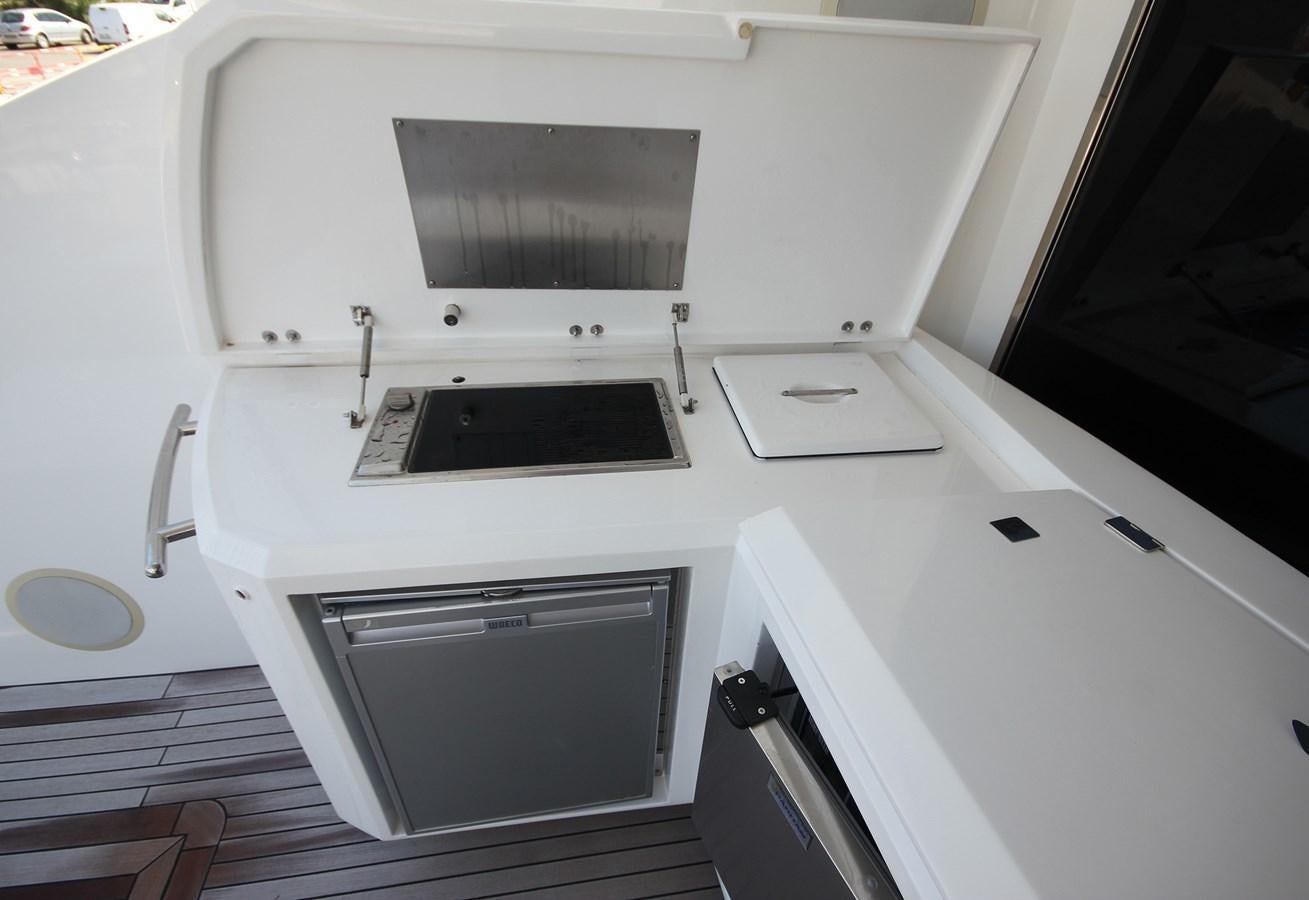 a white microwave oven aboard COPPER 3 Yacht for Sale