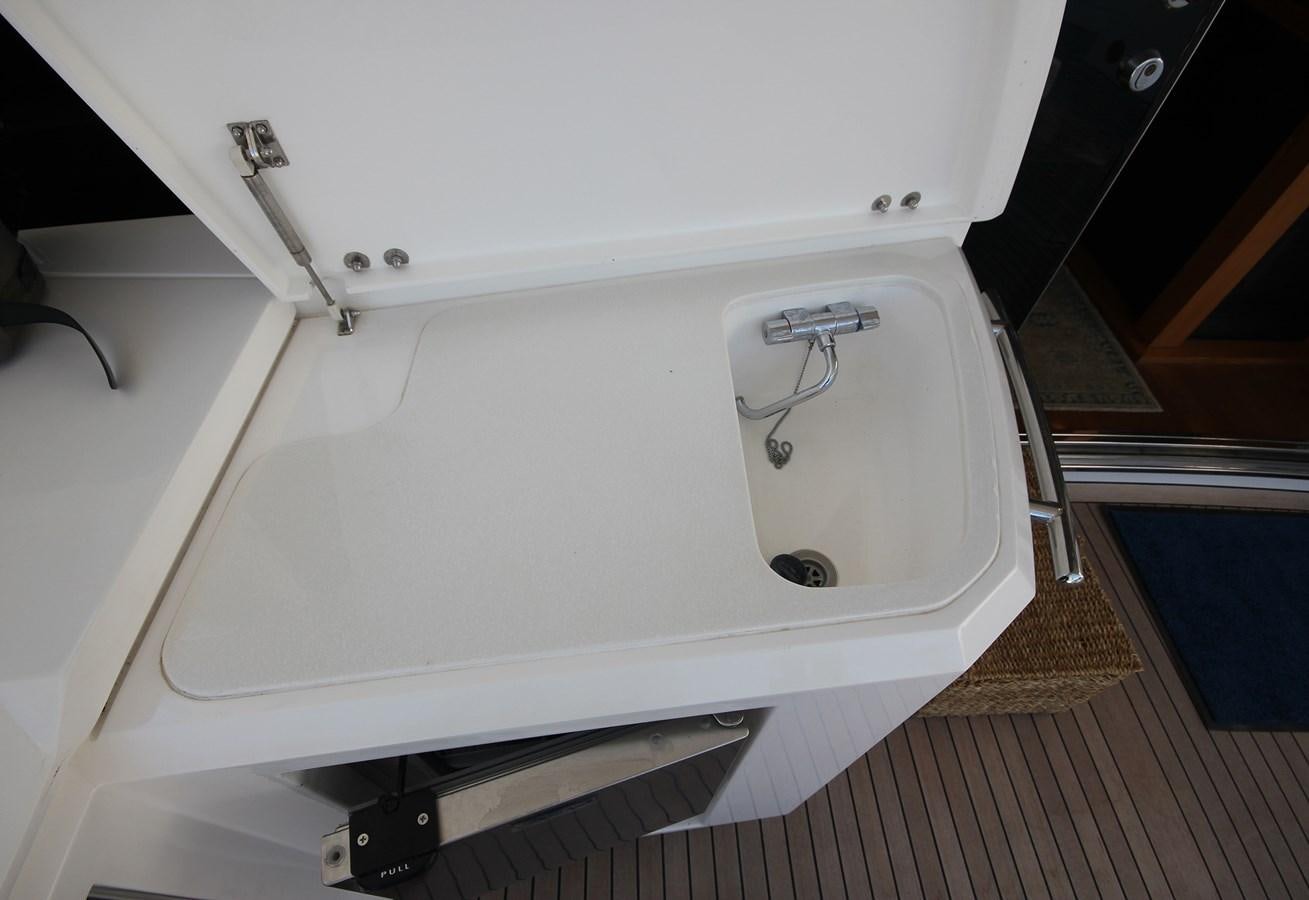 a white sewing machine aboard COPPER 3 Yacht for Sale