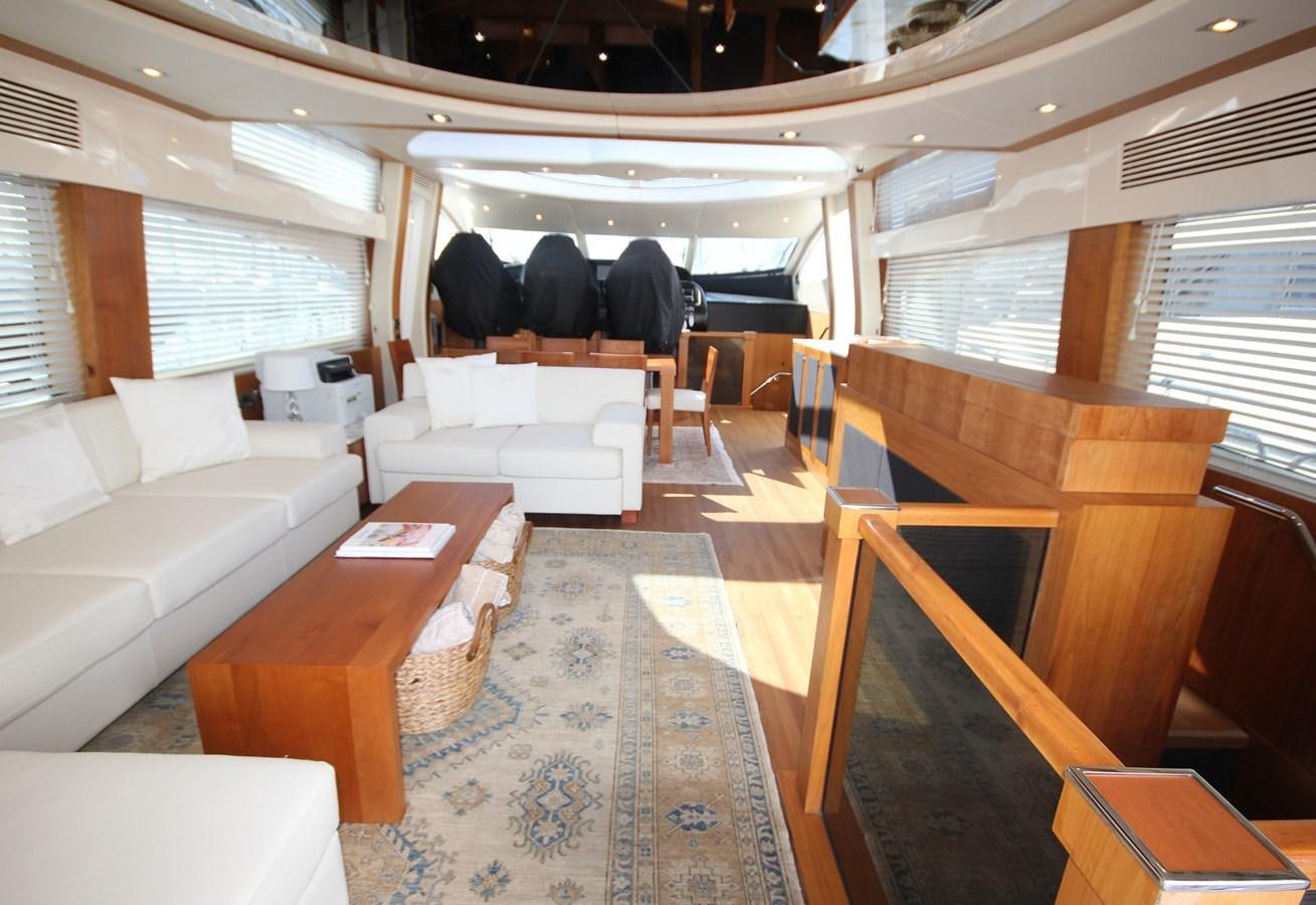 a train with a table and chairs aboard COPPER 3 Yacht for Sale