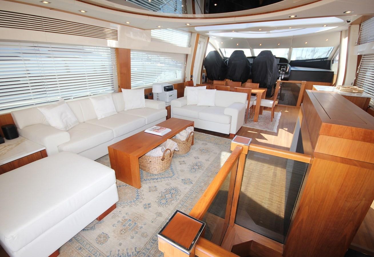 a room with a couch and a table aboard COPPER 3 Yacht for Sale