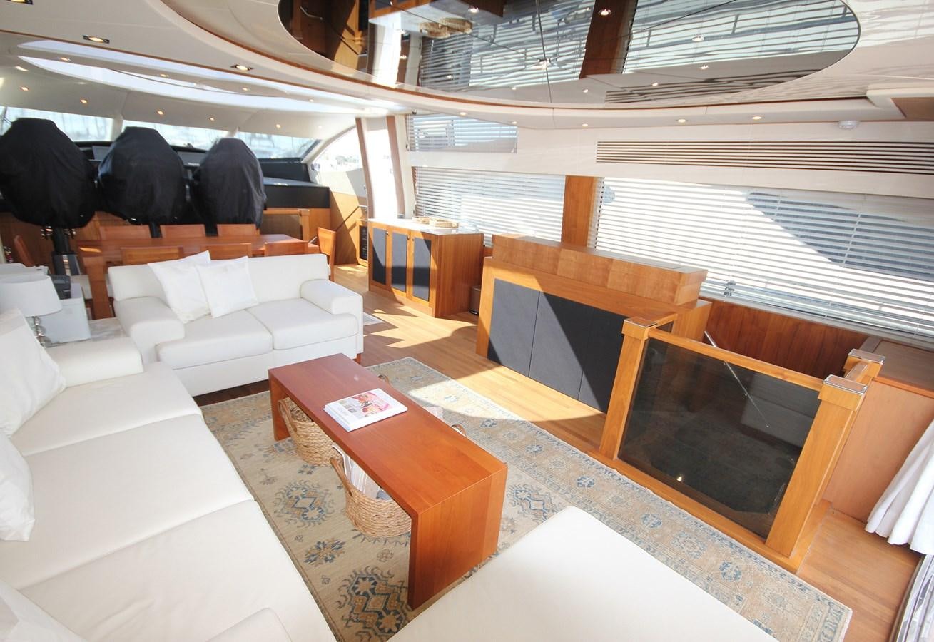 a room with a table and chairs aboard COPPER 3 Yacht for Sale
