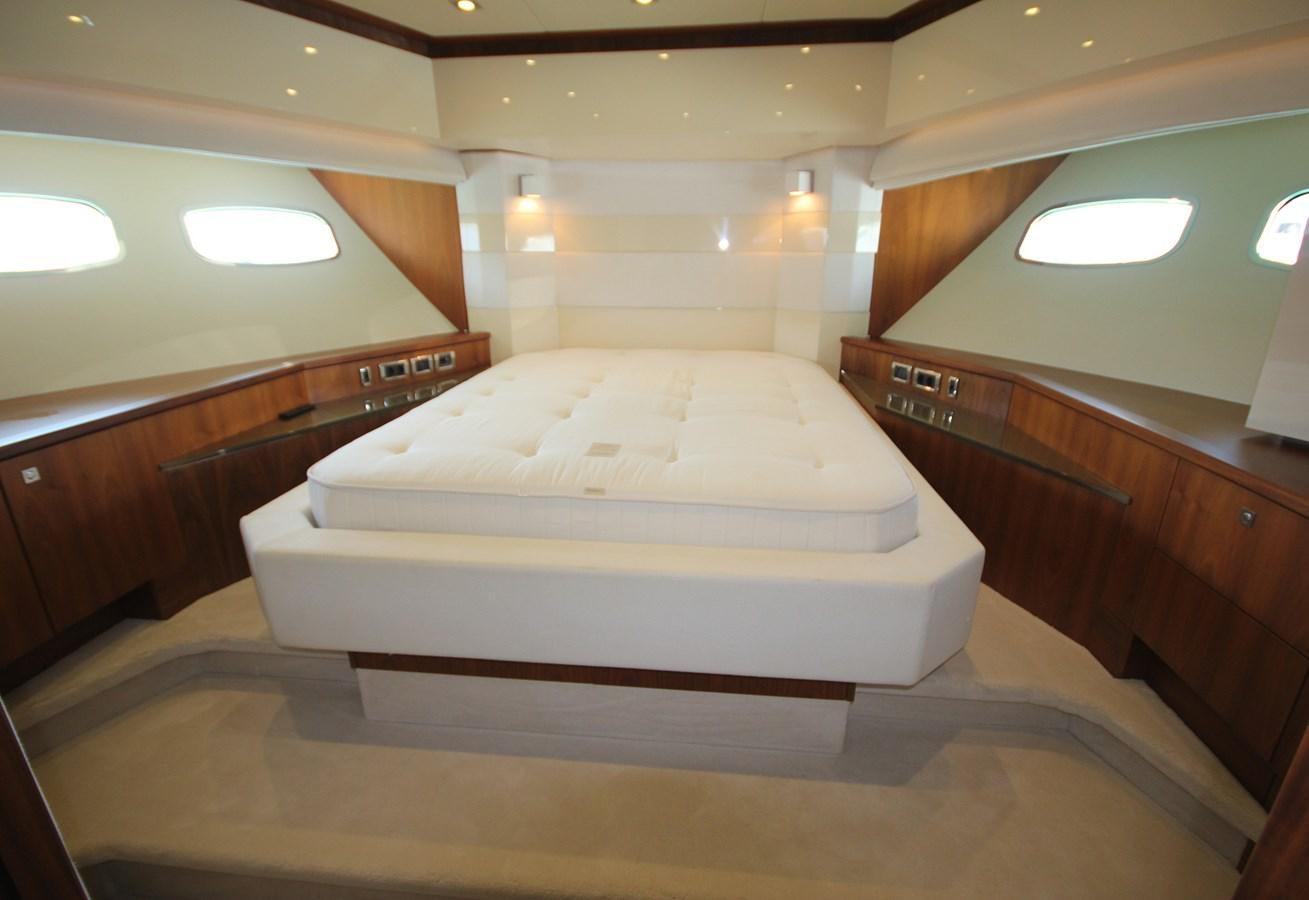 a room with a couple of beds aboard COPPER 3 Yacht for Sale