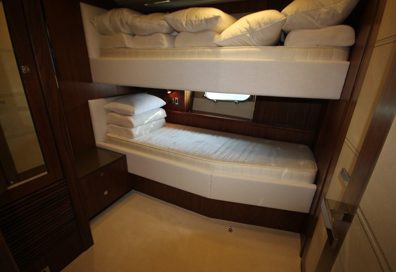 a bed with white sheets aboard COPPER 3 Yacht for Sale