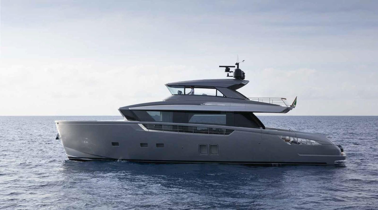 a white yacht in the water aboard EB Yacht for Sale