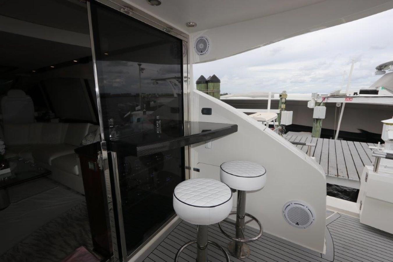 a room with a large black shelf aboard BG Yacht for Sale