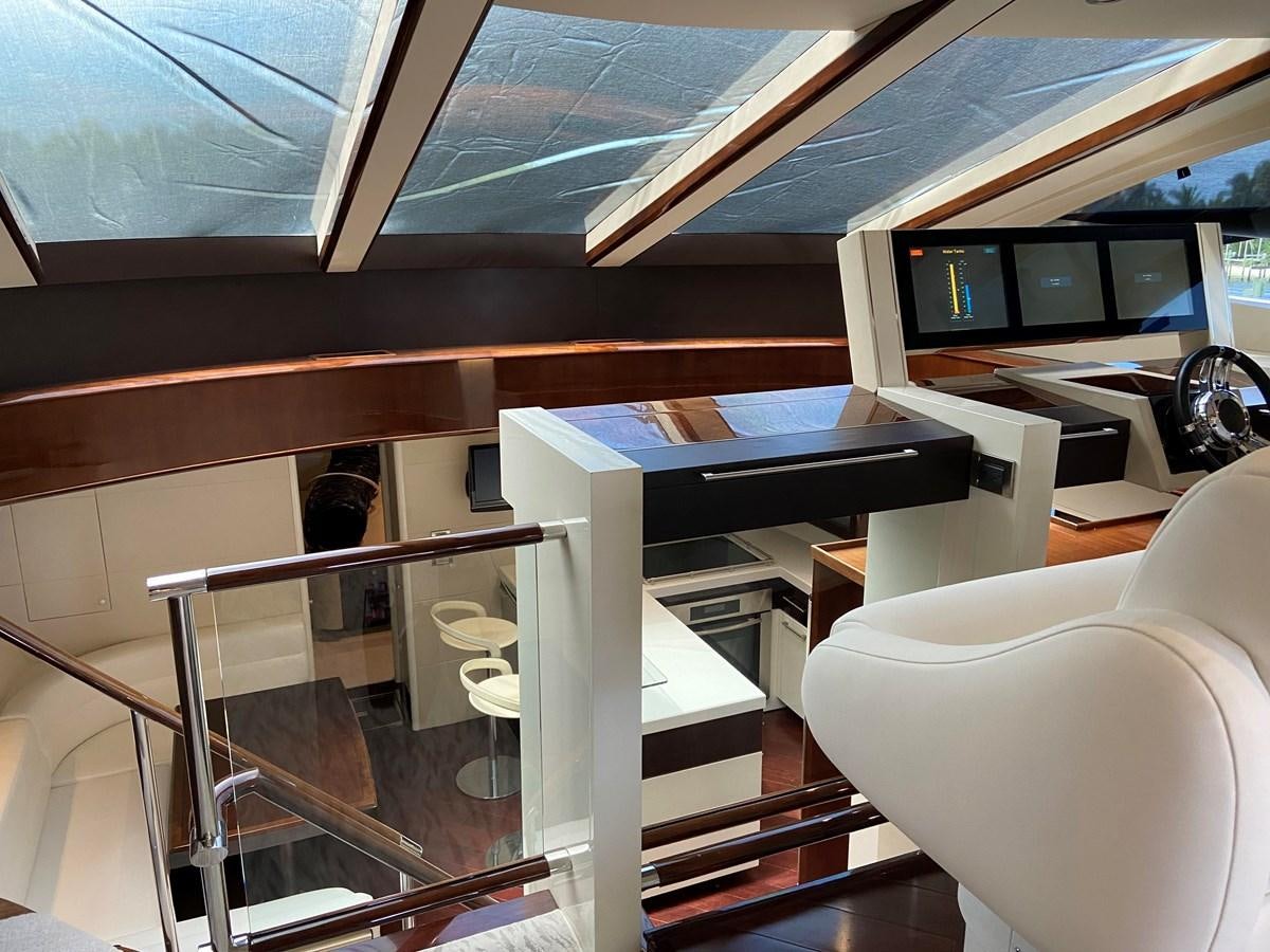 a room with a desk and chairs aboard BG Yacht for Sale