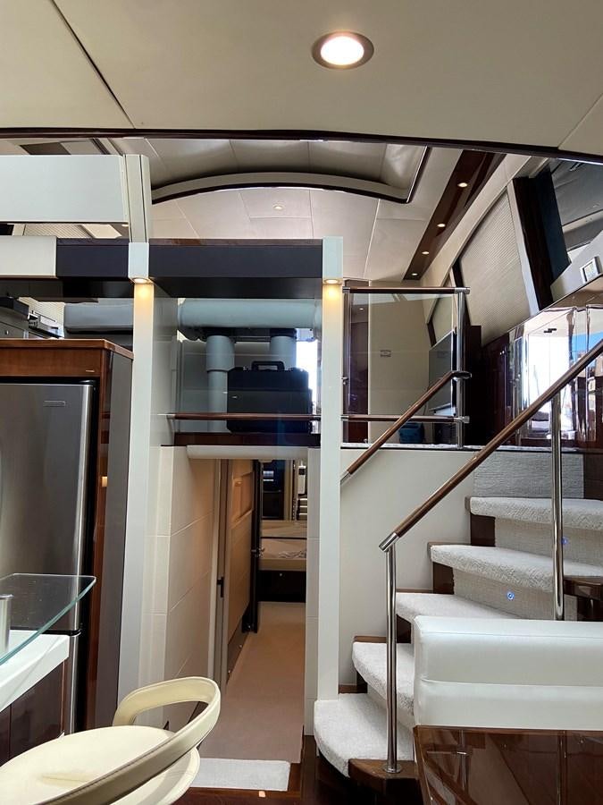 a room with a staircase and a glass door aboard BG Yacht for Sale
