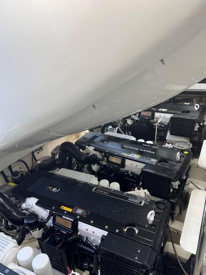 a group of military vehicles aboard BG Yacht for Sale