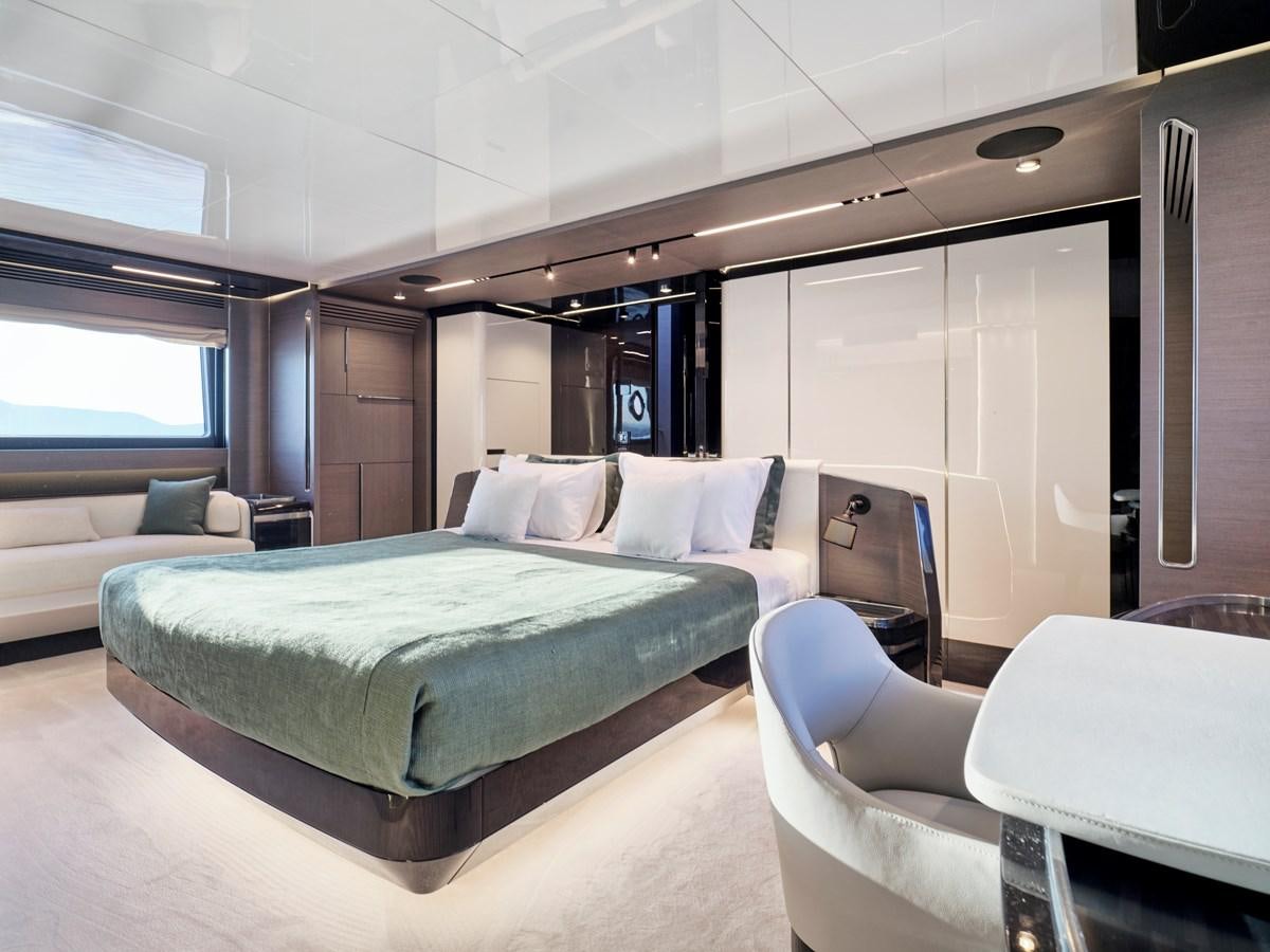 a large bedroom with a bed aboard D FIVE Yacht for Sale