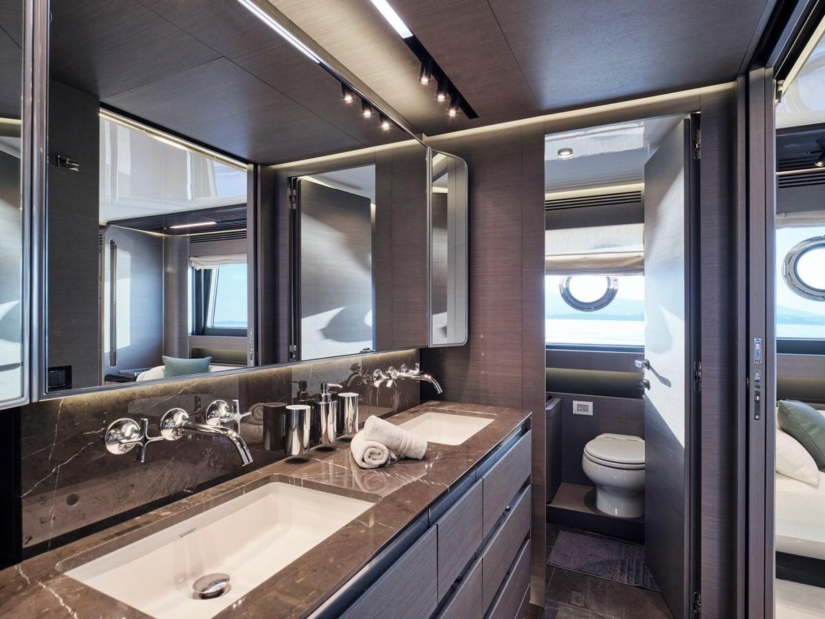 a bathroom with a large mirror aboard D FIVE Yacht for Sale