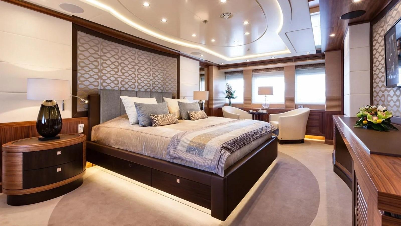 a large bedroom with a large bed aboard ELENA Yacht for Sale