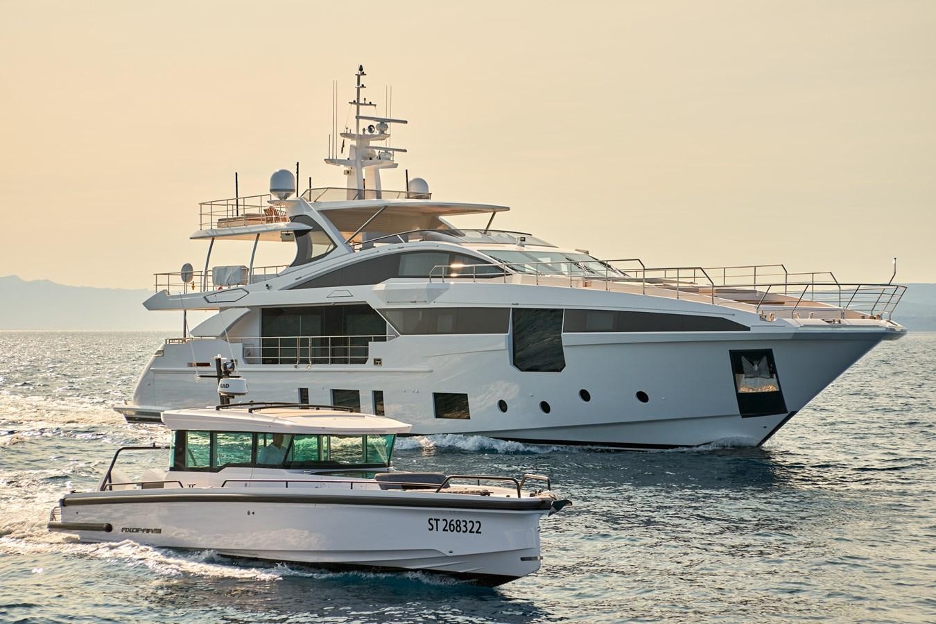 a couple of boats on the water aboard HEED Yacht for Charter