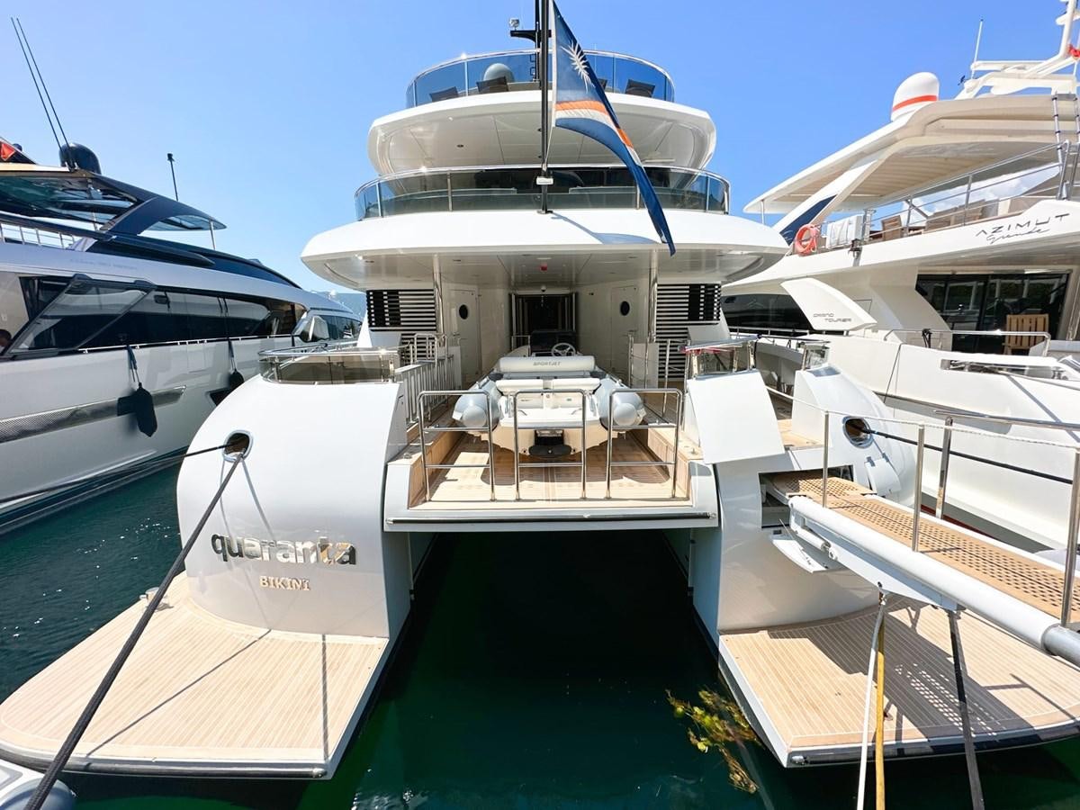 a group of boats are parked in a harbor aboard SHU U RITE Yacht for Sale