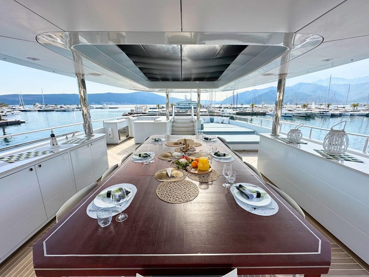 a large kitchen with a large island aboard SHU U RITE Yacht for Sale