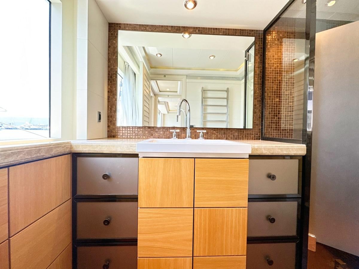 a bathroom with a sink and cabinets aboard SHU U RITE Yacht for Sale