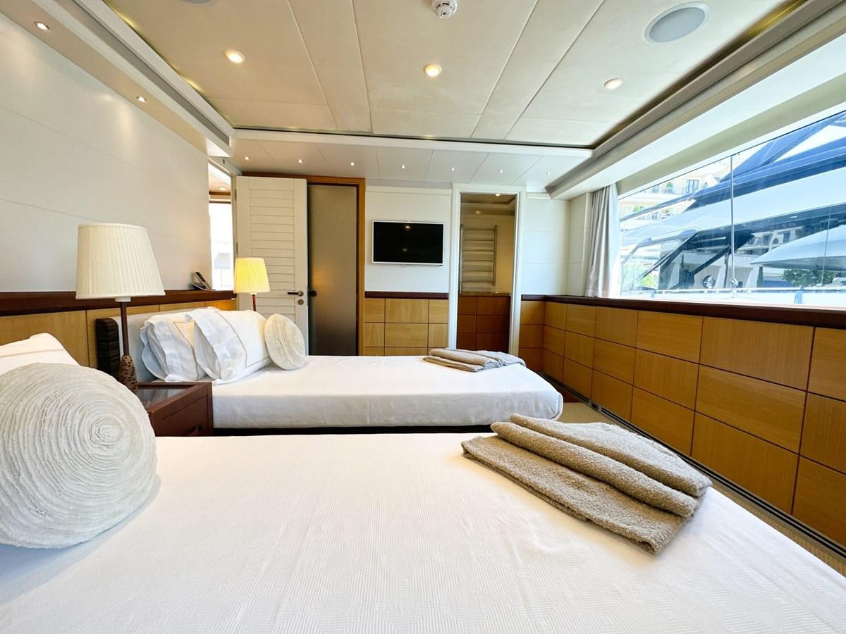 a room with two beds aboard SHU U RITE Yacht for Sale