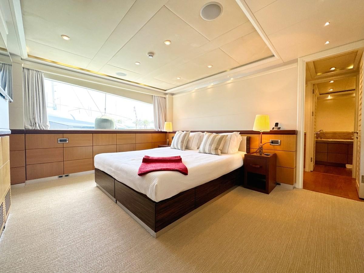 a large bedroom with a large bed aboard SHU U RITE Yacht for Sale