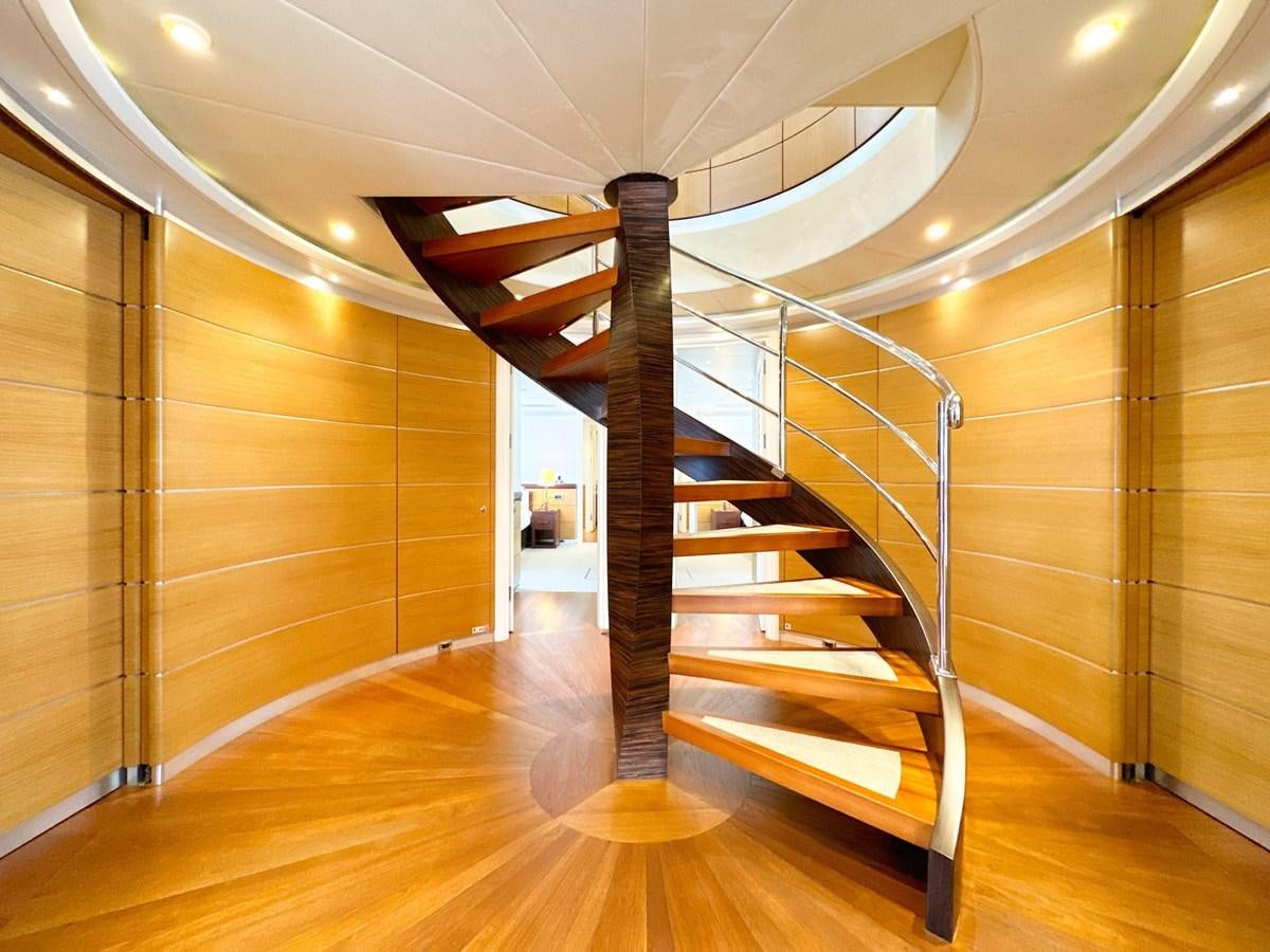 a wooden staircase in a house aboard SHU U RITE Yacht for Sale