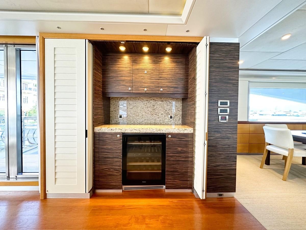 a fireplace in a room aboard SHU U RITE Yacht for Sale