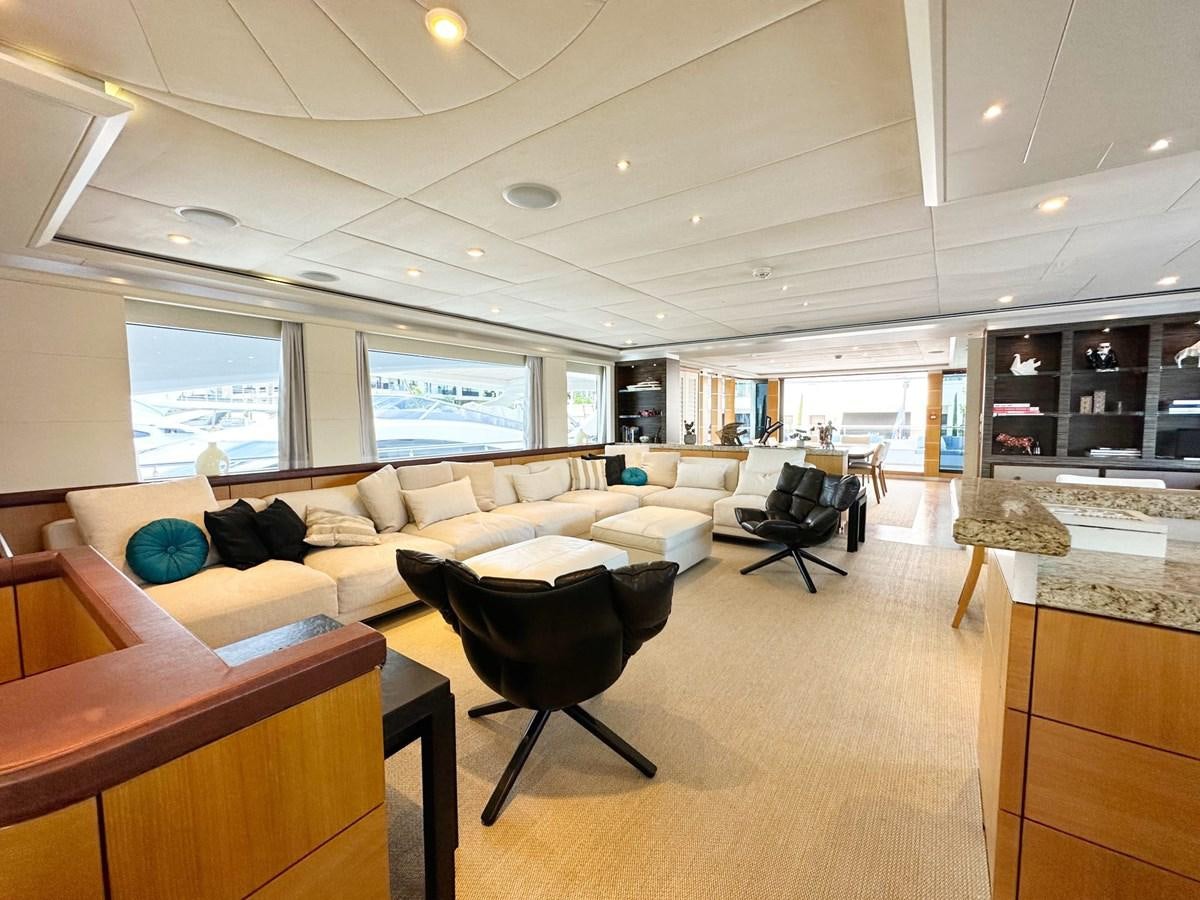 a living room with a couch and a table aboard SHU U RITE Yacht for Sale