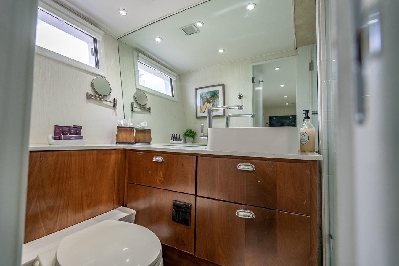 a bathroom with a large mirror aboard MY WAY Yacht for Sale