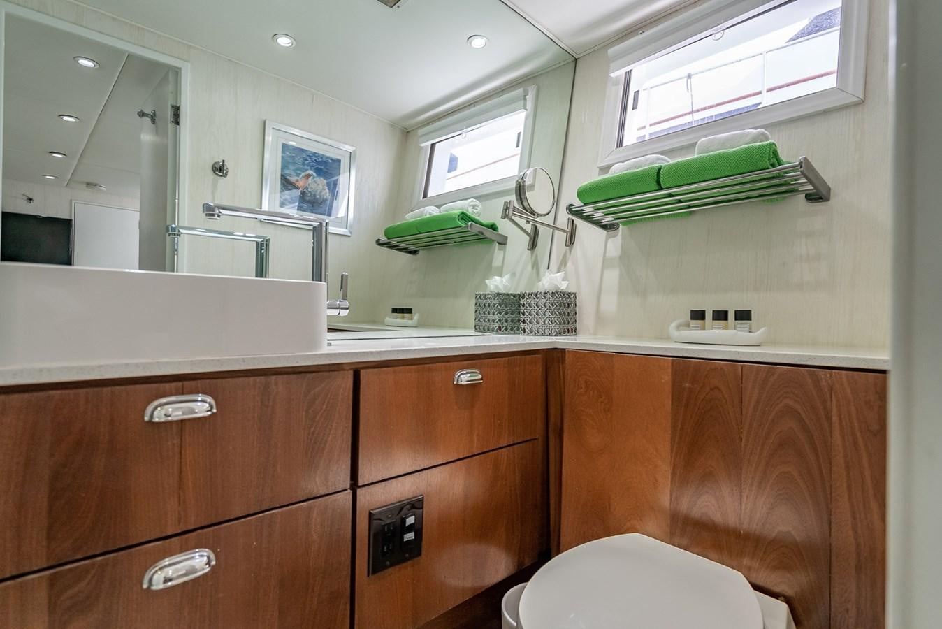 a bathroom with a mirror and a sink aboard MY WAY Yacht for Sale