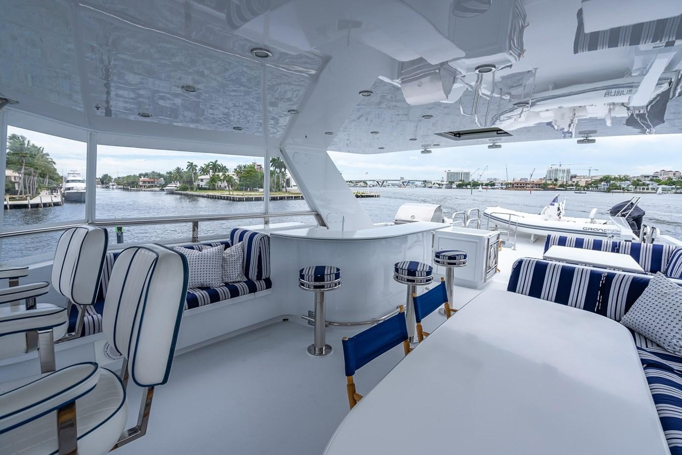 a boat with tables and chairs aboard MY WAY Yacht for Sale