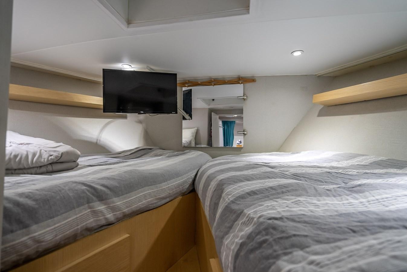 a room with two beds aboard MY WAY Yacht for Sale
