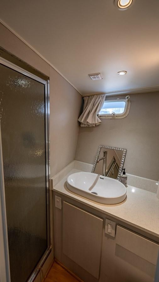 a bathroom with a sink and a shower aboard MY WAY Yacht for Sale