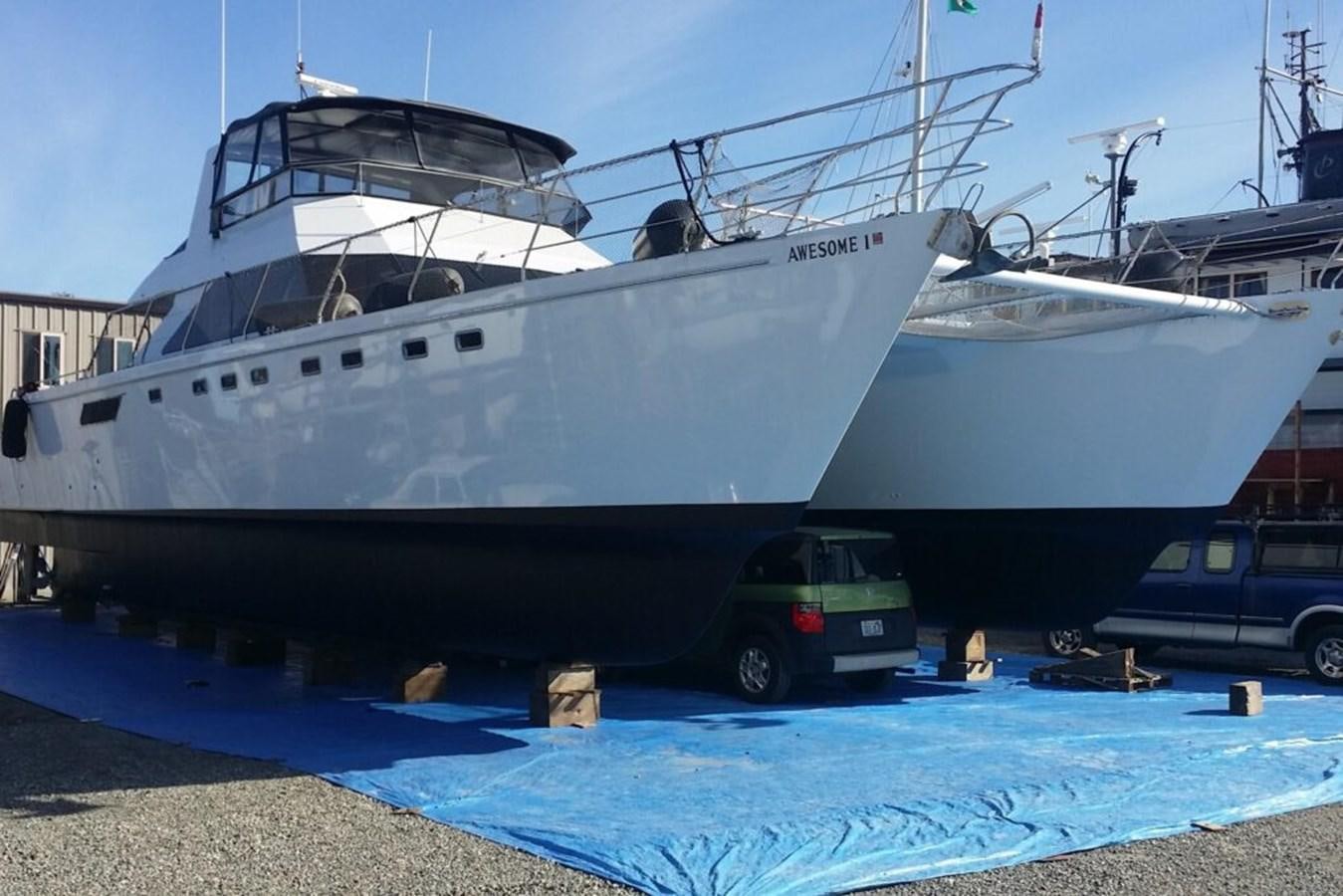 a large white boat aboard AWESOME Yacht for Sale