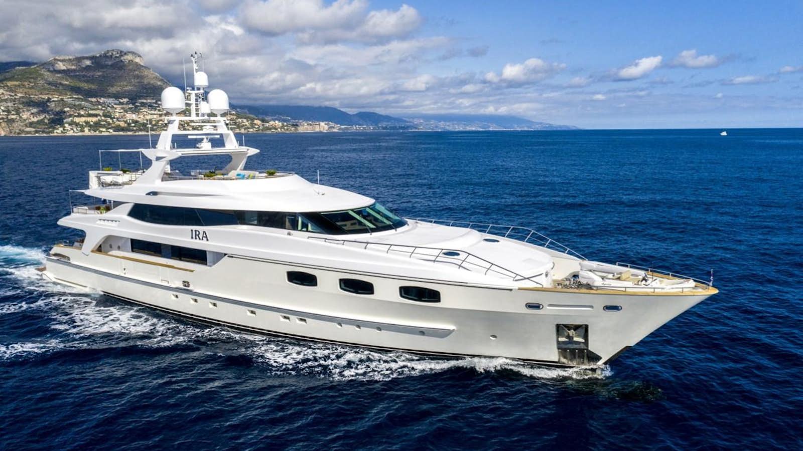 a white yacht in the water aboard TIAMAT Yacht for Sale