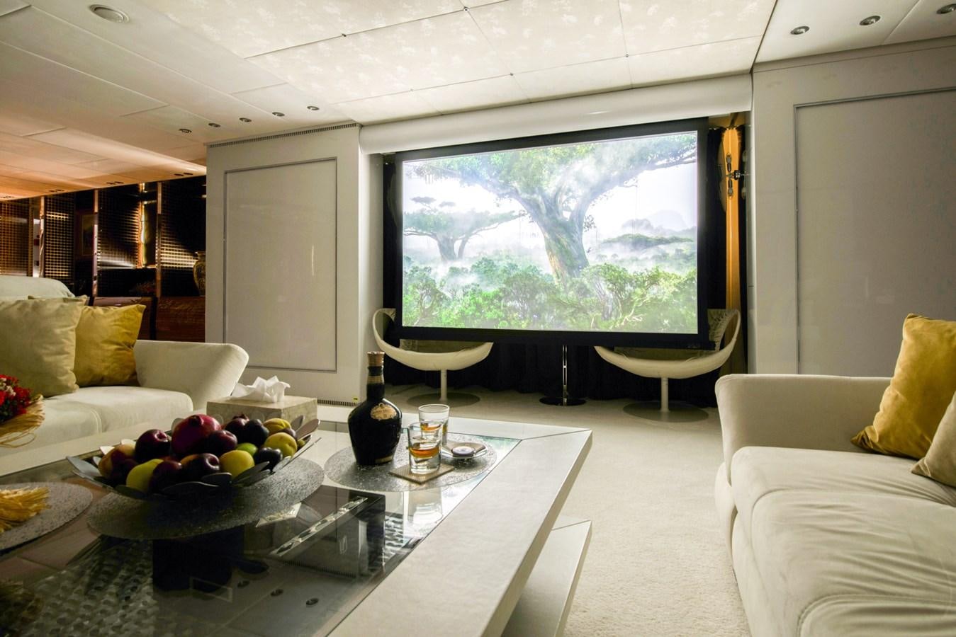 a living room with a large window aboard TIAMAT Yacht for Sale